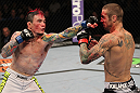 SUNRISE, FL - JUNE 08:   (L-R) Scott Jorgensen punches Eddie Wineland in a Bantamweight bout during the UFC on FX 3 event at Bank Atlantic Center on June 8, 2012 in Sunrise, Florida.  (Photo by Josh Hedges/Zuffa LLC/Zuffa LLC via Getty Images)