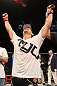 SUNRISE, FL - JUNE 08:   Mike Pyle celebrates after knocking out Josh Neer in a Welterweight bout during the UFC on FX 3 event at Bank Atlantic Center on June 8, 2012 in Sunrise, Florida.  (Photo by Josh Hedges/Zuffa LLC/Zuffa LLC via Getty Images)