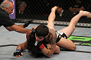 SUNRISE, FL - JUNE 08:   (R-L) Erick Silva defeats Charlie Brenneman with a rear choke submission in a Welterweight bout during the UFC on FX 3 event at Bank Atlantic Center on June 8, 2012 in Sunrise, Florida.  (Photo by Josh Hedges/Zuffa LLC/Zuffa LLC via Getty Images)