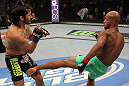 SUNRISE, FL - JUNE 08:   (R-L) Demetrious Johnson kicks Ian McCallin a Flyweight bout during the UFC on FX 3 event at Bank Atlantic Center on June 8, 2012 in Sunrise, Florida.  (Photo by Josh Hedges/Zuffa LLC/Zuffa LLC via Getty Images)
