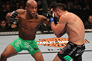 SUNRISE, FL - JUNE 08:   (L-R) Demetrious Johnson punches Ian McCall in a Flyweight bout during the UFC on FX 3 event at Bank Atlantic Center on June 8, 2012 in Sunrise, Florida.  (Photo by Josh Hedges/Zuffa LLC/Zuffa LLC via Getty Images)