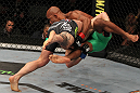 SUNRISE, FL - JUNE 08:   (L-R) Ian McCall takes down Demetrious Johnson in a Flyweight bout during the UFC on FX 3 event at Bank Atlantic Center on June 8, 2012 in Sunrise, Florida.  (Photo by Josh Hedges/Zuffa LLC/Zuffa LLC via Getty Images)