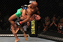SUNRISE, FL - JUNE 08:   (R-L) Ian McCall suplexes Demetrious Johnson in a Flyweight bout during the UFC on FX 3 event at Bank Atlantic Center on June 8, 2012 in Sunrise, Florida.  (Photo by Josh Hedges/Zuffa LLC/Zuffa LLC via Getty Images)