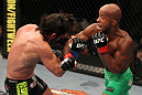 SUNRISE, FL - JUNE 08:   (R-L) Demetrious Johnson punches Ian McCall in a Flyweight bout during the UFC on FX 3 event at Bank Atlantic Center on June 8, 2012 in Sunrise, Florida.  (Photo by Josh Hedges/Zuffa LLC/Zuffa LLC via Getty Images)
