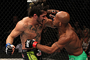 SUNRISE, FL - JUNE 08:   (L-R) Ian McCall and Demetrious Johnson trade punches in a Flyweight bout during the UFC on FX 3 event at Bank Atlantic Center on June 8, 2012 in Sunrise, Florida.  (Photo by Josh Hedges/Zuffa LLC/Zuffa LLC via Getty Images)