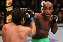 SUNRISE, FL - JUNE 08:   (R-L) Demetrious Johnson punches Ian McCall in a Flyweight bout during the UFC on FX 3 event at Bank Atlantic Center on June 8, 2012 in Sunrise, Florida.  (Photo by Josh Hedges/Zuffa LLC/Zuffa LLC via Getty Images)