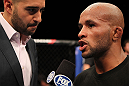SUNRISE, FL - JUNE 08:   (R-L) Demetrious Johnson is interviewed by Jon Anik after his decision victory over Ian McCall in a Flyweight bout during the UFC on FX 3 event at Bank Atlantic Center on June 8, 2012 in Sunrise, Florida.  (Photo by Josh Hedges/Zuffa LLC/Zuffa LLC via Getty Images)