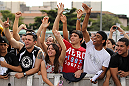 BELO HORIZONTE, BRAZIL - JUNE 20:   Fans cheer during the UFC 147 open workouts at Praca da Estacao on June 20, 2012 in Belo Horizonte, Brazil.  (Photo by Josh Hedges/Zuffa LLC/Zuffa LLC via Getty Images)