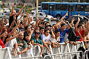 BELO HORIZONTE, BRAZIL - JUNE 20:   Fans cheer during the UFC 147 open workouts at Praca da Estacao on June 20, 2012 in Belo Horizonte, Brazil.  (Photo by Josh Hedges/Zuffa LLC/Zuffa LLC via Getty Images)