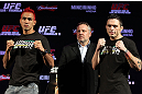 BELO HORIZONTE, BRAZIL - JUNE 21: (L-R) Opponents Godofredo Pepey and Rony "Jason" Mariano Bezerra pose for photos at the UFC 147 press conference at Ouro Minas Palace on June 21, 2012 in Belo Horizonte, Brazil. (Photo by Josh Hedges/Zuffa LLC/Zuffa LLC via Getty Images)