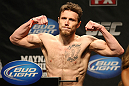 ATLANTIC CITY, NJ - JUNE 21: Dan Miller flexes after making weight during the UFC on FX official weigh in at Revel Casino on June 21, 2012 in Atlantic City, New Jersey.  (Photo by Nick Laham/Zuffa LLC/Zuffa LLC via Getty Images)