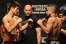 ATLANTIC CITY, NJ - JUNE 21: (L-R) Featherweight opponents Hatsu Hioki and Ricardo Lamas face off after making weight during the UFC on FX official weigh in at Revel Casino on June 21, 2012 in Atlantic City, New Jersey.  (Photo by Nick Laham/Zuffa LLC/Zuffa LLC via Getty Images)