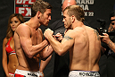 ATLANTIC CITY, NJ - JUNE 21: (L-R) Lightweight opponents Sam Stout and Spencer Fisher face off  during the UFC on FX official weigh in at Revel Casino on June 21, 2012 in Atlantic City, New Jersey.   (Photo by Nick Laham/Zuffa LLC/Zuffa LLC via Getty Images)