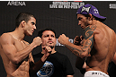 BELO HORIZONTE, BRAZIL - JUNE 22:   (L-R) Opponents Felipe Arantes and Milton Vieira face off after making weight during the UFC 147 weigh in at Est&Atilde;&iexcl;dio Jornalista Felipe Drummond on June 22, 2012 in Belo Horizonte, Brazil.  (Photo by Josh Hedges/Zuffa LLC/Zuffa LLC via Getty Images)