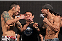 BELO HORIZONTE, BRAZIL - JUNE 22:   (L-R) Opponents Marcos Vinicius and Wagner Campos face off after making weight during the UFC 147 weigh in at Est&Atilde;&iexcl;dio Jornalista Felipe Drummond on June 22, 2012 in Belo Horizonte, Brazil.  (Photo by Josh Hedges/Zuffa LLC/Zuffa LLC via Getty Images)
