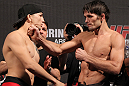 BELO HORIZONTE, BRAZIL - JUNE 22:   (L-R) Opponents Anistavio Medeiros and Rodrigo Damm face off during the UFC 147 weigh in at Estadio Jornalista Felipe Drummond on June 22, 2012 in Belo Horizonte, Brazil.  (Photo by Josh Hedges/Zuffa LLC/Zuffa LLC via Getty Images)