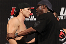 BELO HORIZONTE, BRAZIL - JUNE 22:   Anistavio Medeiros is restrained after facing off with opponent Rodrigo Damm during the UFC 147 weigh in at Estadio Jornalista Felipe Drummond on June 22, 2012 in Belo Horizonte, Brazil.  (Photo by Josh Hedges/Zuffa LLC/Zuffa LLC via Getty Images)