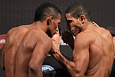 BELO HORIZONTE, BRAZIL - JUNE 22:   (L-R) Opponents Yuri Alcantara and Hacran Dias face off after making weight during the UFC 147 weigh in at Estadio Jornalista Felipe Drummond on June 22, 2012 in Belo Horizonte, Brazil.  (Photo by Josh Hedges/Zuffa LLC/Zuffa LLC via Getty Images)