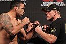 BELO HORIZONTE, BRAZIL - JUNE 22:   (L-R) Opponents Fabricio Werdum and Mike Russow face off after making weight during the UFC 147 weigh in at Estadio Jornalista Felipe Drummond on June 22, 2012 in Belo Horizonte, Brazil.  (Photo by Josh Hedges/Zuffa LLC/Zuffa LLC via Getty Images)
