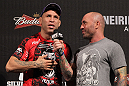 BELO HORIZONTE, BRAZIL - JUNE 22:   (L-R) Wanderlei Silva is interviewed by Joe Rogan after making weight during the UFC 147 weigh in at Estadio Jornalista Felipe Drummond on June 22, 2012 in Belo Horizonte, Brazil.  (Photo by Josh Hedges/Zuffa LLC/Zuffa LLC via Getty Images)