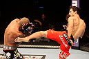 ATLANTIC CITY, NJ - JUNE 22: Ken Stone (R) kicks Dustin Pague (L) in a bantamweight bout during UFC on FX 4 at Revel Casino on June 22, 2012 in Atlantic City, New Jersey.  (Photo by Nick Laham/Zuffa LLC/Zuffa LLC)