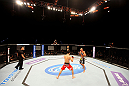 ATLANTIC CITY, NJ - JUNE 22:  Ken Stone (C) circles the octgagon with Ricardo Funch (R) as referee Gasper Oliver (L) looks on in a bantamweight bout during UFC on FX 4 at Revel Casino on June 22, 2012 in Atlantic City, New Jersey.  (Photo by Nick Laham/Zuffa LLC/Zuffa LLC)