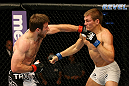ATLANTIC CITY, NJ - JUNE 22: Dan Miller (L) and Ricardo Funch (R) exchange punches in a welterweight bout during UFC on FX 4 at Revel Casino on June 22, 2012 in Atlantic City, New Jersey. (Photo by Nick Laham/Zuffa LLC/Zuffa LLC)