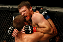ATLANTIC CITY, NJ - JUNE 22: (L-R) Ricardo Funch and Dan Miller grapple against the fence in a welterweight bout during UFC on FX 4 at Revel Casino on June 22, 2012 in Atlantic City, New Jersey.  (Photo by Nick Laham/Zuffa LLC/Zuffa LLC)