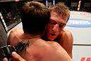 ATLANTIC CITY, NJ - JUNE 22:  Ricardo Funch (R) and Dan Miller (L) grapple against the fence in a welterweight bout during UFC on FX 4 at Revel Casino on June 22, 2012 in Atlantic City, New Jersey.  (Photo by Nick Laham/Zuffa LLC/Zuffa LLC)