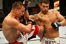 ATLANTIC CITY, NJ - JUNE 22:  Brock Jardine (R) throws a punch against Rick Story (L) who throws a kick in a welterweight bout during UFC on FX 4 at Revel Casino on June 22, 2012 in Atlantic City, New Jersey.  (Photo by Nick Laham/Zuffa LLC/Zuffa LLC)
