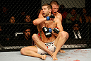 ATLANTIC CITY, NJ - JUNE 22: Brock Jardine (L) punches Rick Story (R) in a welterweight bout during UFC on FX 4 at Revel Casino on June 22, 2012 in Atlantic City, New Jersey.  (Photo by Nick Laham/Zuffa LLC/Zuffa LLC)