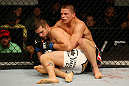 ATLANTIC CITY, NJ - JUNE 22:  Brock Jardine (L) grapples with Rick Story (R) in a welterweight bout during UFC on FX 4 at Revel Casino on June 22, 2012 in Atlantic City, New Jersey.  (Photo by Nick Laham/Zuffa LLC/Zuffa LLC)