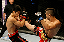 ATLANTIC CITY, NJ - JUNE 22: Ricardo Lamas (R) kicks Hatsu Hioki (L) in a featherweight bout during UFC on FX 4 at Revel Casino on June 22, 2012 in Atlantic City, New Jersey.  (Photo by Nick Laham/Zuffa LLC/Zuffa LLC)
