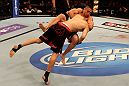 ATLANTIC CITY, NJ - JUNE 22: Hatsu Hioki (T) takes down Ricardo Lamas (B) in a featherweight bout during UFC on FX 4 at Revel Casino on June 22, 2012 in Atlantic City, New Jersey.  (Photo by Nick Laham/Zuffa LLC/Zuffa LLC)