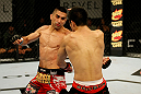 ATLANTIC CITY, NJ - JUNE 22: Ricardo Lamas (L) punches Hatsu Hioki (R) in a featherweight bout during UFC on FX 4 at Revel Casino on June 22, 2012 in Atlantic City, New Jersey.  (Photo by Nick Laham/Zuffa LLC/Zuffa LLC)