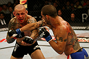 ATLANTIC CITY, NJ - JUNE 22: Cub Swanson (R) punches Ross Pearson (L) in a featherweight bout during UFC on FX 4 at Revel Casino on June 22, 2012 in Atlantic City, New Jersey.  (Photo by Nick Laham/Zuffa LLC/Zuffa LLC)