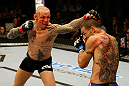 ATLANTIC CITY, NJ - JUNE 22: Ross Pearson (L) punches Cub Swanson (R) in a featherweight bout during UFC on FX 4 at Revel Casino on June 22, 2012 in Atlantic City, New Jersey.  (Photo by Nick Laham/Zuffa LLC/Zuffa LLC)