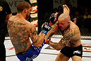 ATLANTIC CITY, NJ - JUNE 22:  Cub Swanson (L) kicks Ross Pearson (R) in a featherweight bout during UFC on FX 4 at Revel Casino on June 22, 2012 in Atlantic City, New Jersey.  (Photo by Nick Laham/Zuffa LLC/Zuffa LLC)