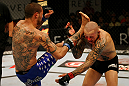 ATLANTIC CITY, NJ - JUNE 22: Cub Swanson (L) kicks Ross Pearson (R) in a featherweight bout during UFC on FX 4 at Revel Casino on June 22, 2012 in Atlantic City, New Jersey.  (Photo by Nick Laham/Zuffa LLC/Zuffa LLC)
