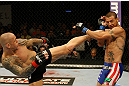 ATLANTIC CITY, NJ - JUNE 22: Ross Pearson (L) kicks Cub Swanson (R) in a featherweight bout during UFC on FX 4 at Revel Casino on June 22, 2012 in Atlantic City, New Jersey.  (Photo by Nick Laham/Zuffa LLC/Zuffa LLC)