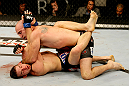ATLANTIC CITY, NJ - JUNE 22:  Brian Ebersole (T) puts an elbow to the face of T.J. Waldburger (B) while grappling in a welterweight bout during UFC on FX 4 at Revel Casino on June 22, 2012 in Atlantic City, New Jersey.  (Photo by Nick Laham/Zuffa LLC/Zuffa LLC)