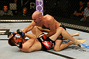 ATLANTIC CITY, NJ - JUNE 22: Brian Ebersole (R) punches T.J. Waldburger (L) in a welterweight bout during UFC on FX 4 at Revel Casino on June 22, 2012 in Atlantic City, New Jersey.  (Photo by Nick Laham/Zuffa LLC/Zuffa LLC)