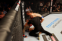 ATLANTIC CITY, NJ - JUNE 22:  Referee Yves Lavigne (C) ends the fight between Ross Pearson (L) and Cub Swanson (R) in a featherweight bout during UFC on FX 4 at Revel Casino on June 22, 2012 in Atlantic City, New Jersey.  (Photo by Nick Laham/Zuffa LLC/Zuffa LLC)