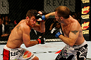 ATLANTIC CITY, NJ - JUNE 22:  Spencer Fisher (R) punches Sam Stout (L) in a lightweight bout during UFC on FX 4 at Revel Casino on June 22, 2012 in Atlantic City, New Jersey.  (Photo by Nick Laham/Zuffa LLC/Zuffa LLC)