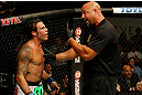 ATLANTIC CITY, NJ - JUNE 22:  Referee Dan Miragliotta (R) warns Clay Guida (L) for inactivity in the main event lightweight bout during UFC on FX 4 at Revel Casino on June 22, 2012 in Atlantic City, New Jersey.  (Photo by Nick Laham/Zuffa LLC/Zuffa LLC)