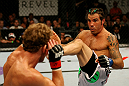 ATLANTIC CITY, NJ - JUNE 22:  Clay Guida (R) kicks Gray Maynard (L) in the main event lightweight bout during UFC on FX 4 at Revel Casino on June 22, 2012 in Atlantic City, New Jersey.  (Photo by Nick Laham/Zuffa LLC/Zuffa LLC)