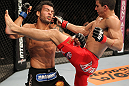 BELO HORIZONTE, BRAZIL - JUNE 23:   (R-L) Felipe Arantes lands a flying knee against Milton Vieira  during their UFC 147 featherweight bout at Estadio Jornalista Felipe Drummond on June 23, 2012 in Belo Horizonte, Brazil.  (Photo by Josh Hedges/Zuffa LLC/Zuffa LLC via Getty Images)
