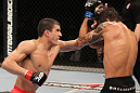 BELO HORIZONTE, BRAZIL - JUNE 23:   (L-R) Felipe Arantes lands a left to the head of Milton Vieira  during their UFC 147 featherweight bout at Estadio Jornalista Felipe Drummond on June 23, 2012 in Belo Horizonte, Brazil.  (Photo by Josh Hedges/Zuffa LLC/Zuffa LLC via Getty Images)