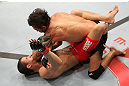 BELO HORIZONTE, BRAZIL - JUNE 23:   (R-L) Milton Vieira delivers an elbow against Felipe Arantes during their UFC 147 featherweight bout at Estadio Jornalista Felipe Drummond on June 23, 2012 in Belo Horizonte, Brazil.  (Photo by Josh Hedges/Zuffa LLC/Zuffa LLC via Getty Images)