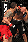 BELO HORIZONTE, BRAZIL - JUNE 23:   (L-R) Marcos Vinicius "Vina" punches Wagner "Galeto" Campos  during their UFC 147 featherweight bout at Estadio Jornalista Felipe Drummond on June 23, 2012 in Belo Horizonte, Brazil.  (Photo by Josh Hedges/Zuffa LLC/Zuffa LLC via Getty Images)